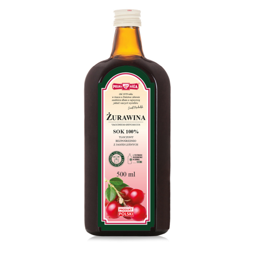 Szklana butelka z ciemnego szkła zawierająca 100% sok z żurawiny. Na etykiecie znajduje się informacja o naturalnym składzie, objętości 500 ml oraz grafika przedstawiająca owoce żurawiny.